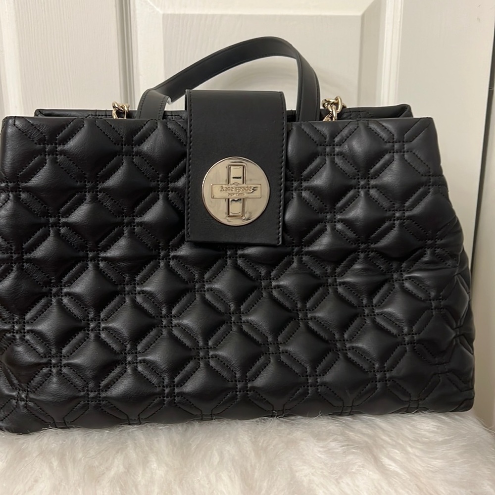 Black Kate Spade purse with gold detailing